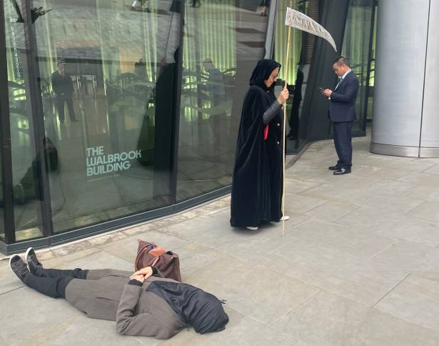 Climate protester lies ‘dead’ outside Vanguard office