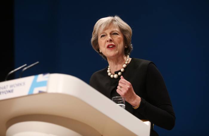 May promises 'unashamedly' pro-business gov't post-Brexit