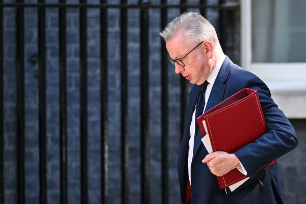 Landlords in breach of cladding law could face prison, says Gove