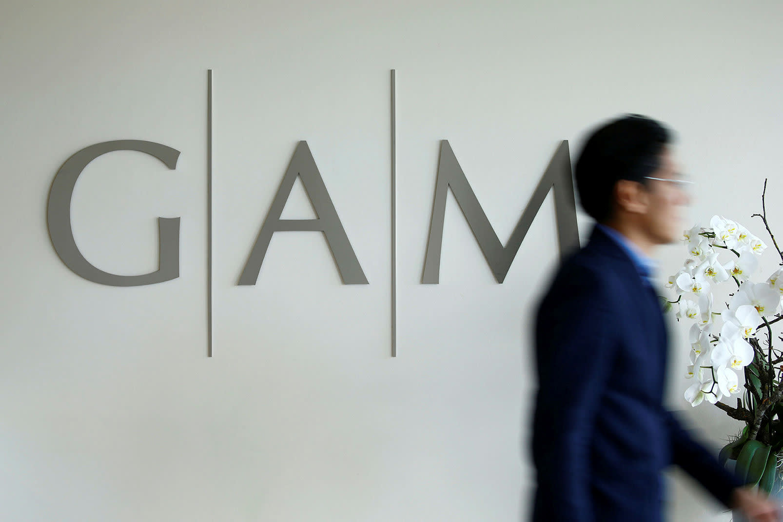GAM issues profit warning after AUM drop