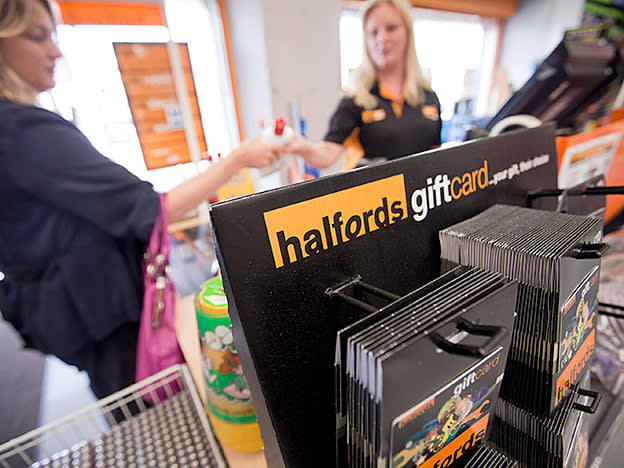 Halfords takes foot off the pedal