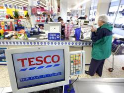 Solid Christmas helps Tesco to extend its lead