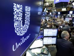 Unilever shareholders back unification