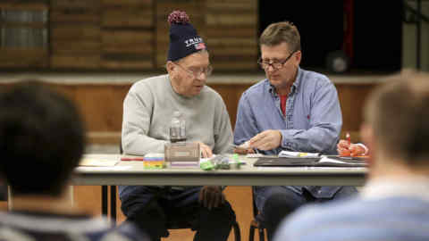 Lawrence Lee, left, of Peosta, Iowa, and David Keck, of Dubuque, Iowa, tally votes during the Republican caucus on Monday, Feb. 3, 2020, at Peosta Community Centre in Peosta, Iowa. (Jessica Reilly/Telegraph Herald via AP)