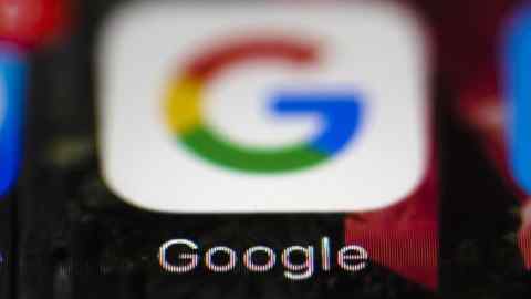 FILE- This April 26, 2017, file photo shows a Google icon on a mobile phone in Philadelphia. Google is spearheading an educational campaign to teach pre-teen children how to protect themselves from scams, predators and other trouble. The program announced Tuesday, June 6, is called ‚ÄúBe Internet Aware.‚Äù (AP Photo/Matt Rourke, File)