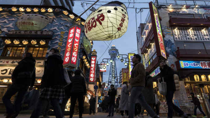 OSAKA, JAPAN - JANUARY 04: People walk through the Shinsekai area on January 04, 2019 in Osaka, Japan. Osaka was selected on November 24, 2018, as the host city for the World Exposition in 2025, beating Ekaterinburg in Russia and the Azerbaijani's capital Baku. (Photo by Tomohiro Ohsumi/Getty Images)