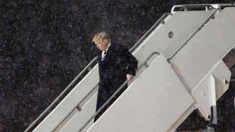 President-elect Donald Trump departs his plane at Gerald R. Ford International Airport, December 9, 2016 in Grand Rapids, Michigan.