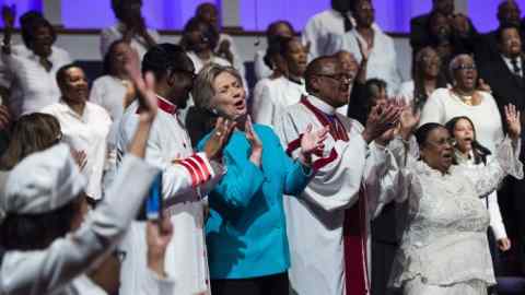 Democratic presidential nominee Hillary Clinton attends Sunday services at Mt. Airy Church of God and Christ November 6, 2016 in Philadelphia, Pennsylvania. Donald Trump barnstorms five states Sunday while Hillary Clinton implores her most fervent supporters to get to the polls, in a frenetic final 48-hour dash to the US presidential election. / AFP PHOTO / Brendan SmialowskiBRENDAN SMIALOWSKI/AFP/Getty Images