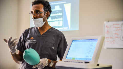 Habtamu Kehali, a trainer of mechanical ventilators, provides training for doctors on how to use mechanical ventilators for the COVID-19 coronavirus patients at the American Medical Center(AMC) in Addis Ababa, Ethiopia, on April 1, 2020. (Photo by Michael Tewelde / AFP) (Photo by MICHAEL TEWELDE/AFP via Getty Images)