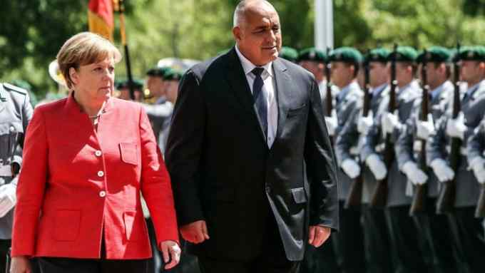 German Chancellor Angela Merkel and Bulgarian Prime Minister Boiko Borissov review an honour guard prior bilateral talks, on June 6, 2017 at the Chancellery in Berlin. / AFP PHOTO / Adam BERRY (Photo credit should read ADAM BERRY/AFP/Getty Images)
