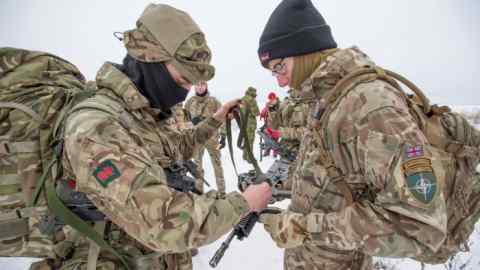 epa06590920 A handout photo made available by the Estonian Defense Forces shows British and Danish troops, currently serving as part of the NATO battle group, in Muhu, Estonia, 08 March 2018 (issued 09 March 2018). About a hundred British and Danish military personnel marched across the sea ice from the Estonian mainland to the island of Muhu to participate in a training exercise on the island. EPA/ARDI HALLISMAA / ESTONIAN DEFENCE FORCES / HANDOUT HANDOUT EDITORIAL USE ONLY/NO SALES