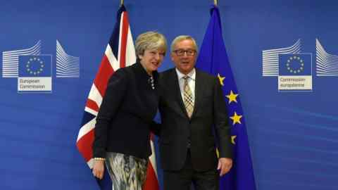 British Prime Minister Theresa May (L) and European Commission chief Jean-Claude Juncker pose prior to a Brexit negotiation meeting on December 4, 2017 at the European Commission in Brussels. British Prime Minister Theresa May meets European Commission chief Jean-Claude Juncker on December 4 as an &quot;absolute&quot; deadline to reach a Brexit divorce deal expires / AFP PHOTO / JOHN THYS (Photo credit should read JOHN THYS/AFP/Getty Images)