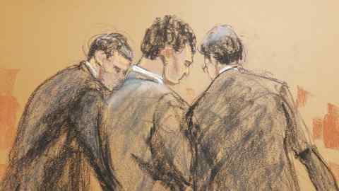 In a courtroom sketch, FTX founder Sam Bankman-Fried stands with his lawyers after the verdict is read out