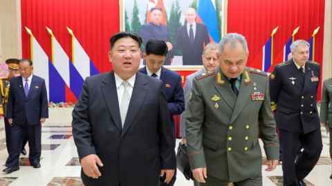 North Korean leader Kim Jong Un (left) and Russian Defense Minister Sergei Shoigu (right)