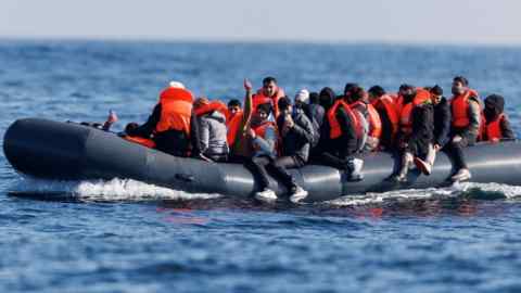 Migrants on a small boat
