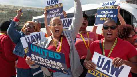 UAW members rally in Detroit in support of striking autoworkers