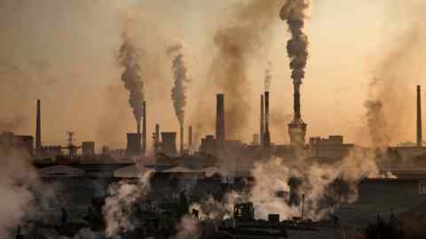 Smoke billows from a steel plant in Inner Mongolia. Early stage funding for climate tech companies has climbed from $418m in 2013 to $16.1bn last year
