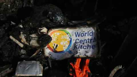 A picture of the World Central Kitchen logo on a vehicle damaged in the attack