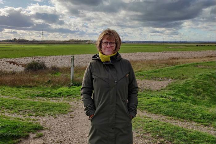 Marie King on England’s north Kent coast. She says of the nearby battery storage project: 'We’re not against renewable energy — we just think it needs to be in the right place'
