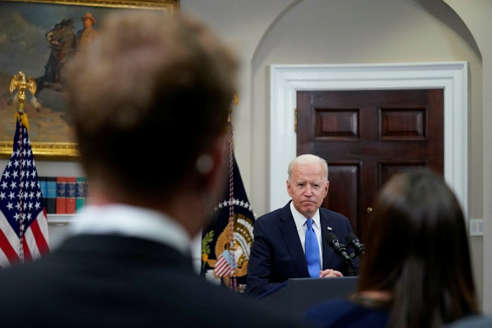President Joe Biden talks to the media
