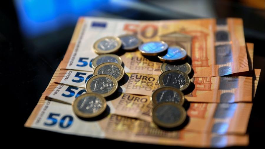 Euro regains ground against dollar as global economic outlook improves
