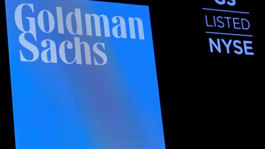 Former Goldman banker accused of passing inside tips to squash partner