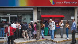 Venezuela’s banks hunker down and prepare for the worst